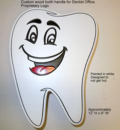 Tooth shaped door pull