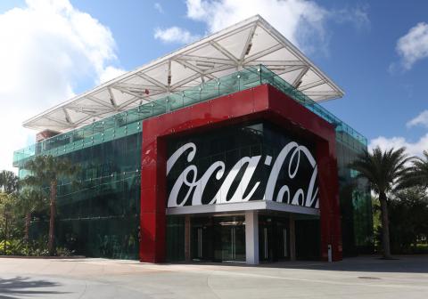Coca Cola Store Glass entry doors with long round pull handles