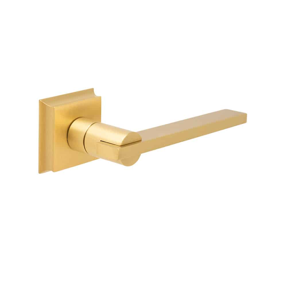 A modern gold door handle showcasing elegance and simplicity