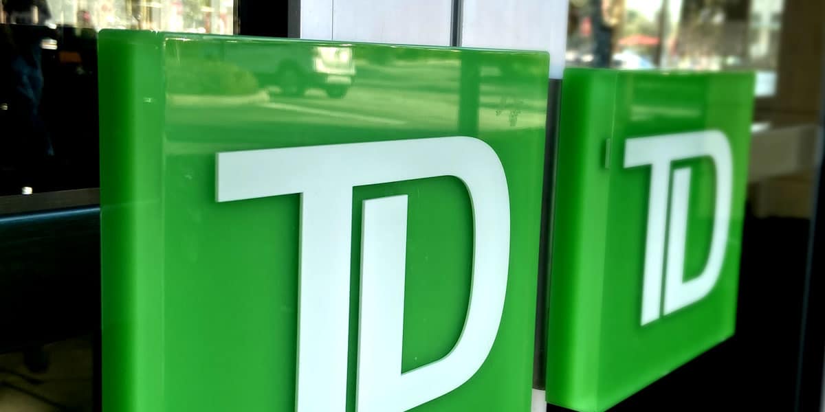 TD Bank green logo door pulls at a branch entrance