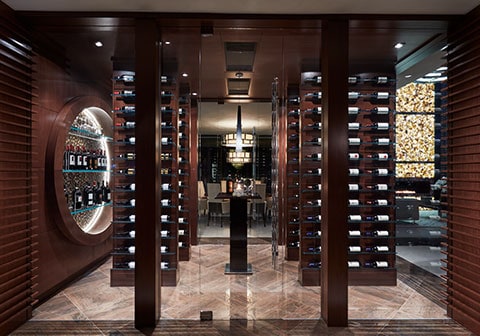 Elegant wine cellar with wooden shelves