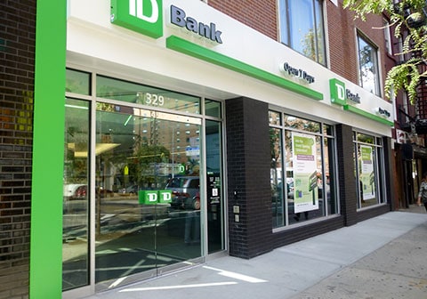 TD Bank branch exterior with logo door handles