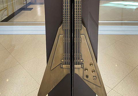 Close up of Guitar shaped door handles